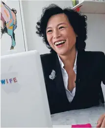  ?? Photo: REUTERS ?? Love letters: Gigi Chao reacts while reading marriage proposal emails at her office in Hong Kong.