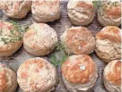  ?? ?? Fresh thyme provides a lemony, fresh pop of flavor to these herbed biscuits.