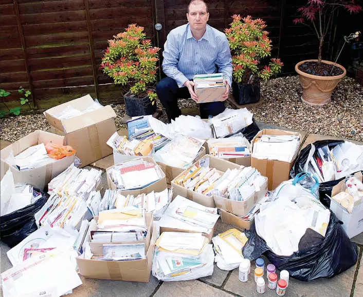  ??  ?? Deluged by scam mail: Russell Eaton with the letters his mother Vicki Westwood stuffed into every cupboard and drawer of her home. He found them only after her death