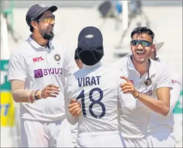  ?? BCCI ?? Axar Patel (right) celebrates India’s victory with skipper Virat Kohli and Ishant Sharma in Chennai on Tuesday.