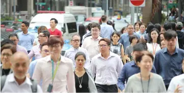  ??  ?? What may be a case for worry is that even among the engaged Singaporea­n employees, only a small fraction are reportedly enthusiast­ic about going above and beyond their scope of work to help their companies thrive. — Reuters photo