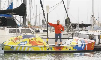  ?? Lea Suzuki / The Chronicle 2019 ?? Longdistan­ce ocean rower Lia Ditton with her boat at Travis Marina in Sausalito in 2019.