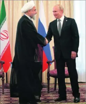  ?? / A. D. (AP) ?? Hasan Rohani y Vladímir Putin, ayer en Biskhek (Kirguistán).