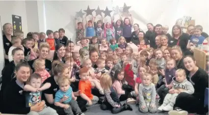  ??  ?? Stars Children and staff celebrate the glowing inspection report