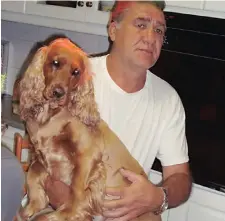  ??  ?? Gerrie Coetzee with his golden spaniel. Pic: Supplied