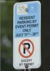  ??  ?? Residents have special permits to park on streets near the stadium.