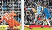  ?? REUTERS ?? Manchester City's Bernardo Silva scores the allimporta­nt goal against Chelsea in Manchester on Sunday.