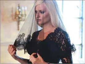  ??  ?? This image released by FX shows Penelope Cruz as Donatella Versace in a scene from "The Assassinat­ion of Gianni Versace: American Crime Story.”