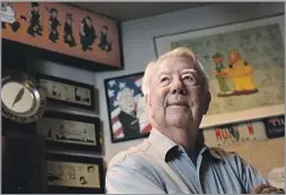  ?? Craig Ruttle Associated Press ?? THE ANTICS OF A LAZY ARMY PRIVATE Mort Walker, shown in 2010, launched “Beetle Bailey” as a college humor strip in 1950. He attributed its success to Beetle’s reluctance to follow authority.