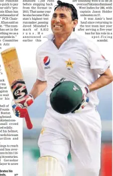  ?? AFP ?? Younis Khan celebrates his 10,000th run in Tests.