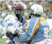  ?? PHOTO BY SIX NATIONS CHIEFS ?? Peterborou­gh Lakers' Robert Hope and Randy Staats of the Six Nations Chiefs lock up during Game 4 of the Major Series Lacrosse final Sunday.