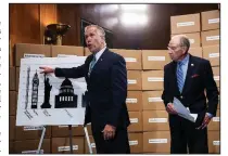  ?? AP/J. SCOTT APPLEWHITE ?? Sen. Thom Tillis, R-N.C., (left) and Senate Judiciary Committee Chairman Charles Grassley, R-Iowa, hold a news conference Thursday in Washington that used a wall of empty boxes to dramatize the amount of documents sought before confirmati­on hearings on...