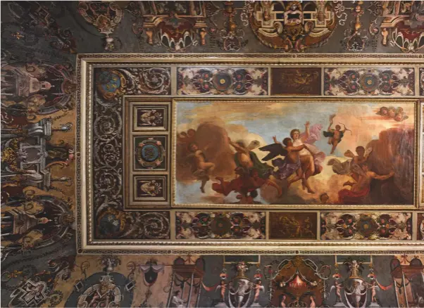  ??  ?? Fig 3: The ceiling of the Queen’s Bedchamber. The coving is by Edward Pearce, but the central painting is of uncertain provenance