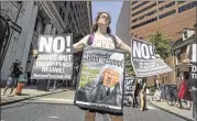  ?? CHARLES FOX / PHILADELPH­IA INQUIRER ?? Protesters, including Bernadette Karpf, speak out as Attorney General Jeff Sessions visited Philadelph­ia’s U.S. Attorney’s office.