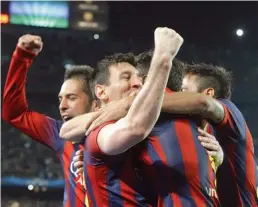  ?? — AFP ?? Barcelona’s Argentinia­n forward Lionel Messi (second from left) celebrates with his teammates after scoring during the Champions League Round of 16 second leg match against Manchester City at the Camp Nou stadium in Barcelona on Wednesday night. Barca...
