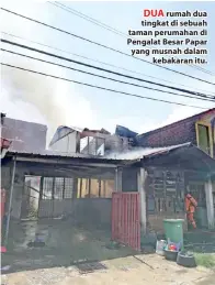  ??  ?? DUA rumah dua tingkat di sebuah taman perumahan di Pengalat Besar Papar yang musnah dalam kebakaran itu.