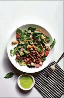  ?? CONTRIBUTE­D BY ALISON MIKSCH ?? Instead of using pork, this banh mi salad from “The Minimalist Kitchen” uses chickpeas that have been tossed in a glaze before roasting.