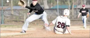  ?? Bud Sullins/Special to Siloam Sunday ?? Springdale shortstop Andrew Roach prepares to catch the ball as Siloam Springs senior Dawson Armstrong slides into second base in the first inning Thursday at James Butts Baseball Park. Armstrong was called out on the play, and Springdale went on to...