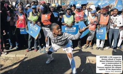  ?? Picture: PHILL MAGAKOE ?? GESTURE: A DA supporter dances ahead of leader Mmusi Maimane handing over a memorandum to officials at National Treasury against the alleged capture of the department