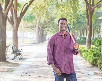  ?? JEFF BLAKE, USA TODAY SPORTS ?? Cubs minor leaguer Chris Singleton, in Charleston, S.C., spreads the love of his mother, Sharonda Coleman-Singleton, who was killed by Dylann Roof.