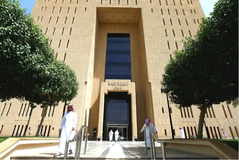  ??  ?? People are seen at the General Court in Riyadh. The legal reforms have attracted less media coverage because they are highly technical, but they are extensive, ranging from new laws to the creation of courts and training of judges, and they have accelerate­d over the past couple of years. – Reuters photo