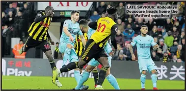  ??  ?? LATE SAVIOUR: Abdoulaye Doucoure heads home the Watford equaliser