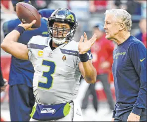  ?? Norm Hall Getty Images/tns ?? Reports surfaced Friday that former Seahawks quarterbac­k Russell Wilson tried to get coach Pete Carroll fired before leaving Seattle.