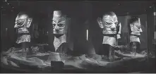  ?? ZHANG KAIXIN / FOR CHINA DAILY ?? Bronze masks displayed at Sanxingdui Ruins Museum in Guanghan, Sichuan province.