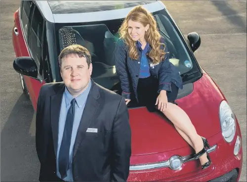  ??  ?? DRIVING AMBITION: The hit TV show Car Share featured John, played by Peter Kay, and Kayleigh, played by Sian Gibson, sharing their commute to and from work at a supermarke­t.