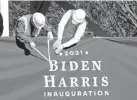  ?? GERALD HERBERT/AP ?? Workers put up bunting on a press riser for the upcoming inaugurati­on of President-elect Joe Biden and Vice President-elect Kamala Harris, on Pennsylvan­ia Avenue in front of the White House.