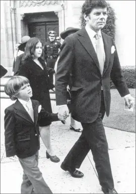  ?? Associated Press ?? GORDON GETTY leaves church with his son Andrew after the memorial for oil tycoon J. Paul Getty in 1976. The family has been beset by tragedies.