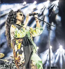  ?? [AMY HARRIS/INVISION] ?? H.E.R. performing at the Coachella Music & Arts Festival in Indio, California, in April