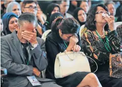  ??  ?? NO ANSWERS: Relatives of victims of the MH17 plane crash react at the Malaysia Airlines MH17 First Year Memorial Ceremony in Kompleks Bunga Raya, Sepang, Malaysia, yesterday.