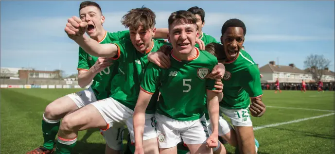  ??  ?? Kailin Barlow, second from left, celebrates with team-mates and Oisin Hand (middle) who scored during the U15 Internatio­nal Friendly match between Republic of Ireland U15s and Czech Republic U15s. Pic: Stephen McCarthy/Sportsfile