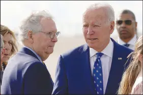  ?? PATRICK SEMANSKY / ASSOCIATED PRESS ?? Senate Minority Leader Mitch Mcconnell of Kentucky looks to President Joe Biden after Biden arrived Jan. 4 in Hebron, Ky. Mcconnell found places to support Biden’s agenda, most notably when he cast his vote in favor of the infrastruc­ture bill. There will likely be fewer crossovers.