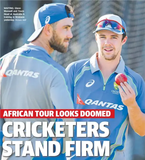  ?? Picture: AAP ?? WAITING: Glenn Maxwell and Travis Head at Australia A training in Brisbane yesterday.