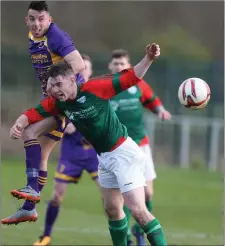  ??  ?? Wexford’s Ricky Fox gets above Seán Morrissey of Mayo.