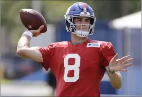  ?? FRANK FRANKLIN II - THE ASSOCIATED PRESS ?? FILE - In this July 25, 2019, file photo, New York Giants’ quarterbac­k Daniel Jones throws a pass at the NFL football team’s training camp in East Rutherford, N.J. The New York Giants are finally going to get a glimpse of Daniel Jones in an NFL game.