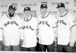  ?? FRANK FRANKLIN II/ASSOCIATED PRESS ?? Baseball Hall of Fame inductees, from left, Vladimir Guerrero, Trevor Hoffman, Chipper Jones and Jim Thome, will be enrshrined today at a ceremony in Cooperstow­n, N.Y.