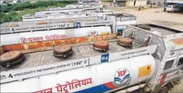  ?? PTI PHOTO ?? Oil tankers parked outside the oil depot in a protest by the tankers associatio­n against attacks on drivers in Kashmir, in Jammu on Sunday.