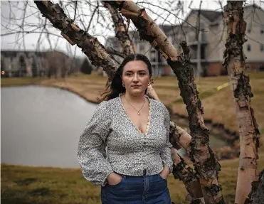  ?? MADDIE MCGARVEY / THE NEW YORK TIMES ?? Shea German-Tanner, 22, a social worker in Fort Wayne, Indiana, says she feels like she can’t save money because she is always living paycheck to paycheck. “I feel like the older generation is constantly pushing you to do stuff like they did when they were in their 20s, but it’s not even comparable to when they were in their 20s,”