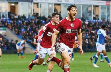  ?? Picture: Rogan Thomson/JMP ?? Chris Martin, front, celebrates his winning goal for Bristol City at Peterborou­gh