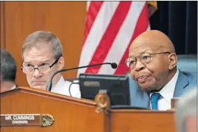  ?? [AP PHOTO/J. SCOTT APPLEWHITE] ?? House Oversight and Reform Committee Chair Elijah Cummings, D-Md., is joined at left by Rep. Jim Jordan, R-Ohio, ranking member, as Michael Cohen, President Donald Trump's former personal lawyer, testifies on Wednesday.