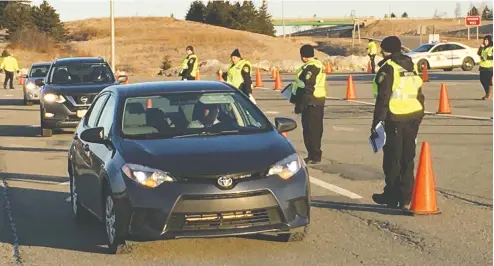  ?? DARRELL COLE ?? People entering Nova Scotia near Amherst on Monday morning are being told to self-isolate for 14 days.