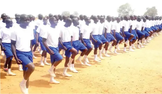  ?? PHOTO: ?? Second Batch of 1,554 youth marshals at the opening ceremony of their training in Gombe yesterday.