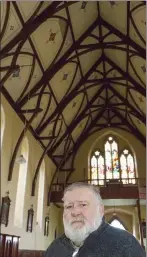  ??  ?? Fr John Nolan in Duncannon church where some plaster fell from the ceiling (left).