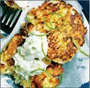  ??  ?? Cauliflowe­r cheese fritters