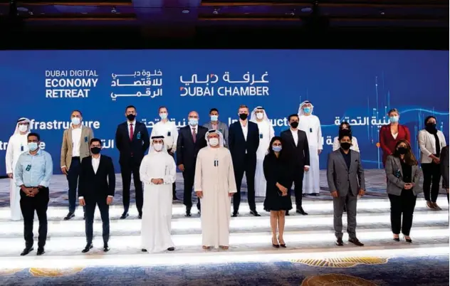  ?? ?? ↑
Top officials of the Dubai Chamber of Digital Economy along with industry experts during the event on Tuesday.