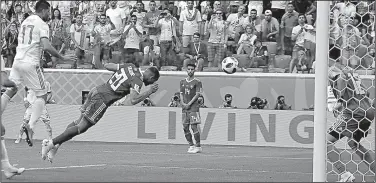  ?? AP/THEMBA HADEBE ?? (20) scores an own goal during the Group B match between Morocco and Iran on Friday at the World Cup in St. Petersburg Stadium at St. Petersburg, Russia. The goal gave Iran a 1-0 victory.