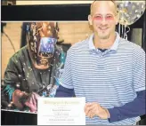  ?? CONTRIBUTE­D ?? Russell Hawthorne with his welding certificat­e at Coffee Correction­al Facility in Nicholls.